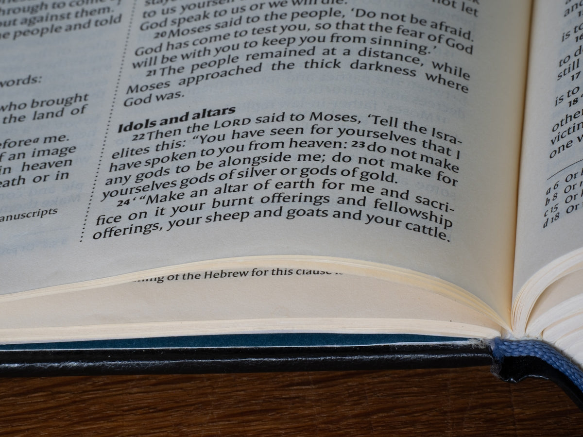 Open book with text and scripture